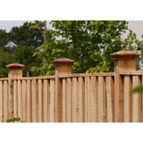 Wooden fence post caps on wood fence posts