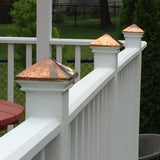 flat wood post cap with copper pyramid on deck railing posts